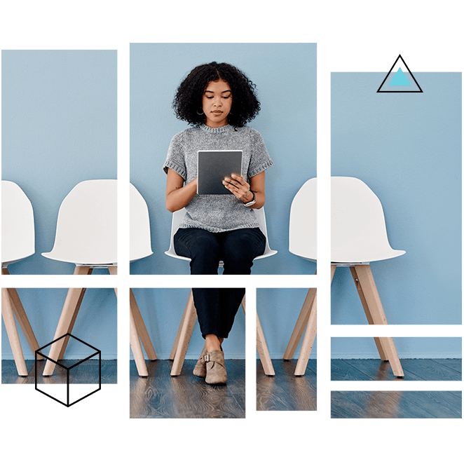woman sitting in a chair on a tablet